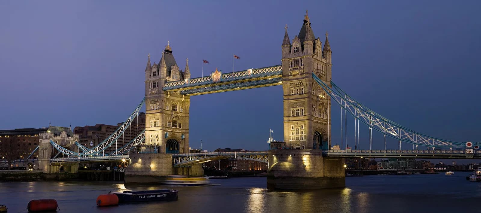 Tower Bridge illuminated at dusk in London